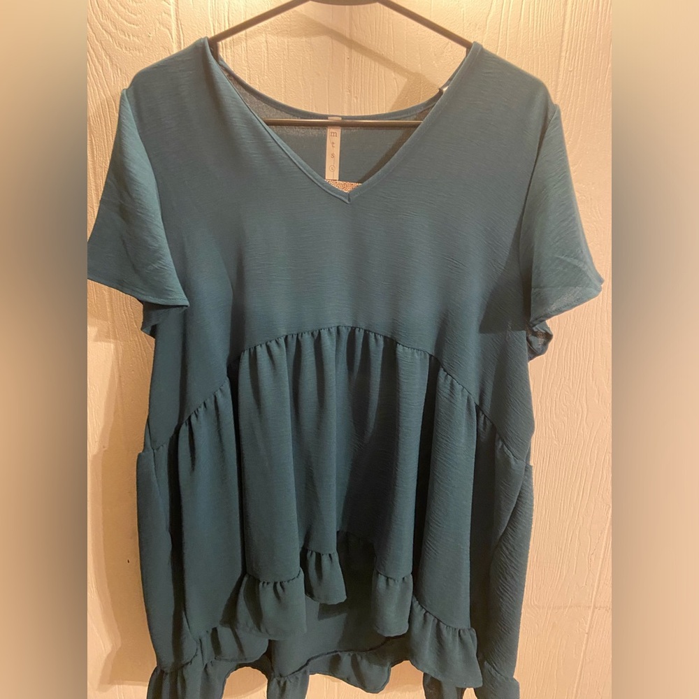 MTS Teal Blouse with high low ruffle bottom.